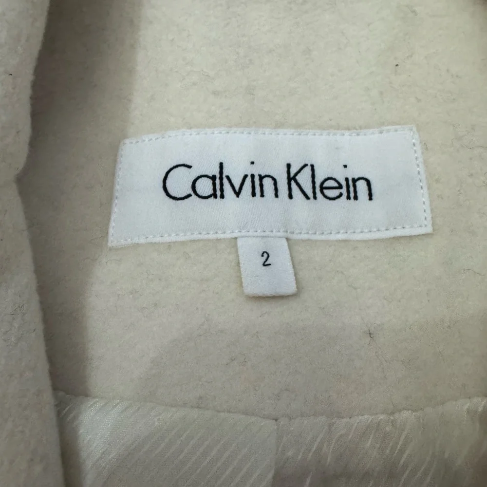Calvin Klein Women’s Cream Trench Coat with Black Trim – Size 2